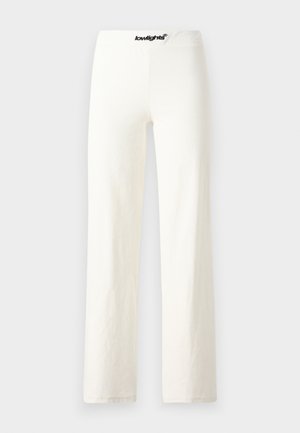 White cotton wide-leg pants with a smooth texture, featuring a black logo waistband and a simple, minimalistic design.