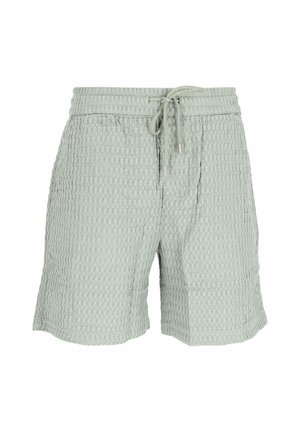 Light green textured shorts with elastic waistband and drawstring, knee-length, suitable for casual wear.
