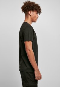 Merchcode MIAMI VICE RETRO - T-shirts med print - black