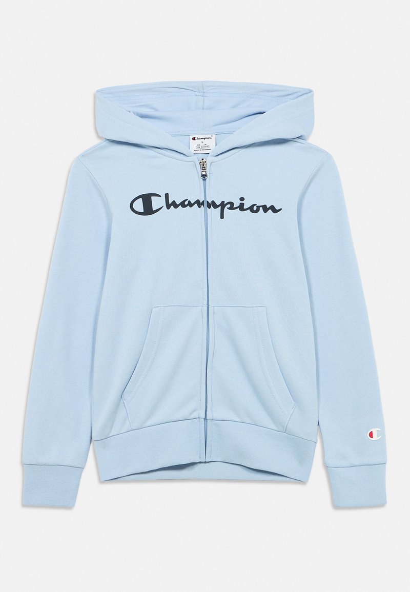 Sweat à capuche zippé bleu clair avec un grand logo noir "Champion" sur la poitrine, poches avant et capuche. Tissu doux avec poignets côtelés.