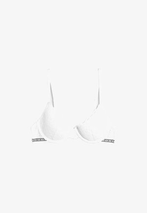 Biała koronkowa bielizna z lekko usztywnionymi miseczkami, falbankowymi brzegami i regulowanymi ramiączkami. Posiada czarno-białą ozdobną taśmę na dole.