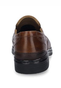 Brown leather shoe with rounded heel, smooth texture, and stitched accents. Black rubber sole with ribbed detail. Back view.