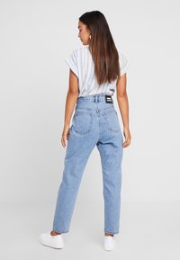 Dr.Denim Petite NORA  - Calças de ganga de corte relaxado - light retro