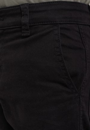 WE Fashion Hlačami s stranskimi žepi - black