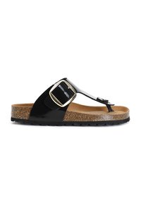 Sandal in pelle lucida nera con sottopiedi in sughero, dettaglio della fibbia regolabile e suola in gomma testurizzata, progettata per comfort e uso casual.