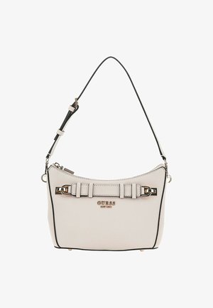 Sac à épaule beige avec accents noirs. Matériau lisse, forme courbée, featuring une bandoulière décorative et du matériel doré. Fermeture à glissière.