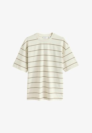 T-shirt di cotone color crema con maniche corte e colletto rotondo. Presenta strisce orizzontali marroni sul davanti. Texture morbida.