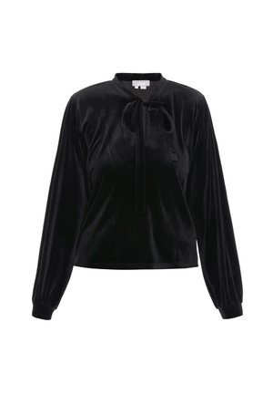 Juodas aksominio bluzonas su ilgomis rankovėmis, apvaliu kaklu ir priekiniais raiščiais. Pasižymi švelnia tekstūra ir laisvu siluetu.