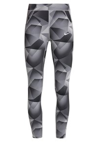 Harmaat ja mustat geometriset kuviot sisältävät urheilulegginsit, joissa on slim fit -malli ja pieni valkoinen Nike-logo reiden yläosassa.