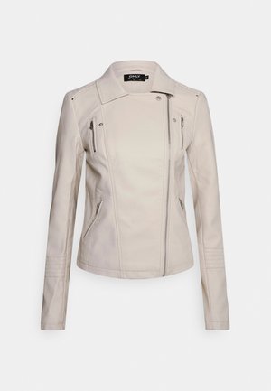 Beige dames nep leren bikerjack met asymmetrische rits, ritsen op borst en zijzakken, en gestikte details op de mouwen.