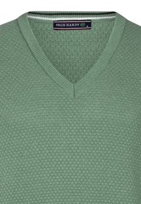 Groen gebreid sweater, V-hals ontwerp met een gestructureerd honingraatpatroon. Ribgebreide afwerking rondom de hals, label toont "Felix Hardy" en maat "M."