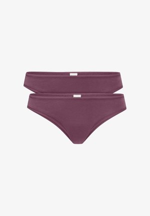 Bikiniunterteil in dunklem Mauve, mit glatter Textur, nahtlosem Design und kontrastierendem weißen Etikett. Klassischer Schnitt mit seitlichen Trägern.