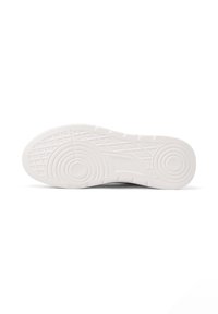 Sole di scarpa sportiva bianca con motivi circolari e grip testurizzato, mostrata piatta su sfondo bianco.