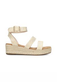 Beige espadrille wedge sandals with three strap design, ankle buckle, and textured fabric upper. Braided jute midsole for added height.
