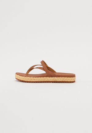 Brown flip-flop sandal with dual straps in textured material, featuring an espadrille-style woven midsole and a rubber outsole.