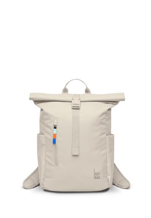 Beige roll-top backpack with front zipper pocket, colorful zipper pull, side pockets, top handle, and shoulder straps, branded "GOT BAG."