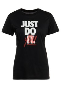 Svart t-shirt i bomull med stor vit text som lyder "JUST DO" och "you!" i rött, med rund halsringning och korta ärmar.