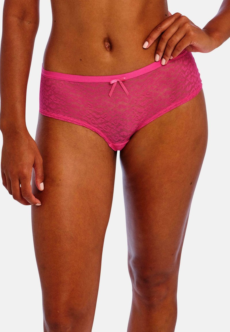 Roze kanten hipsteronderbroekjes hebben een doorschijnend ontwerp, een golvend patroon en een decoratieve strik bij de tailleband. Zacht en lichtgewicht stof.