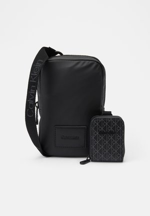 PUFFER UTILITY PHONE CROSSBODY - Taštička na mobil - black