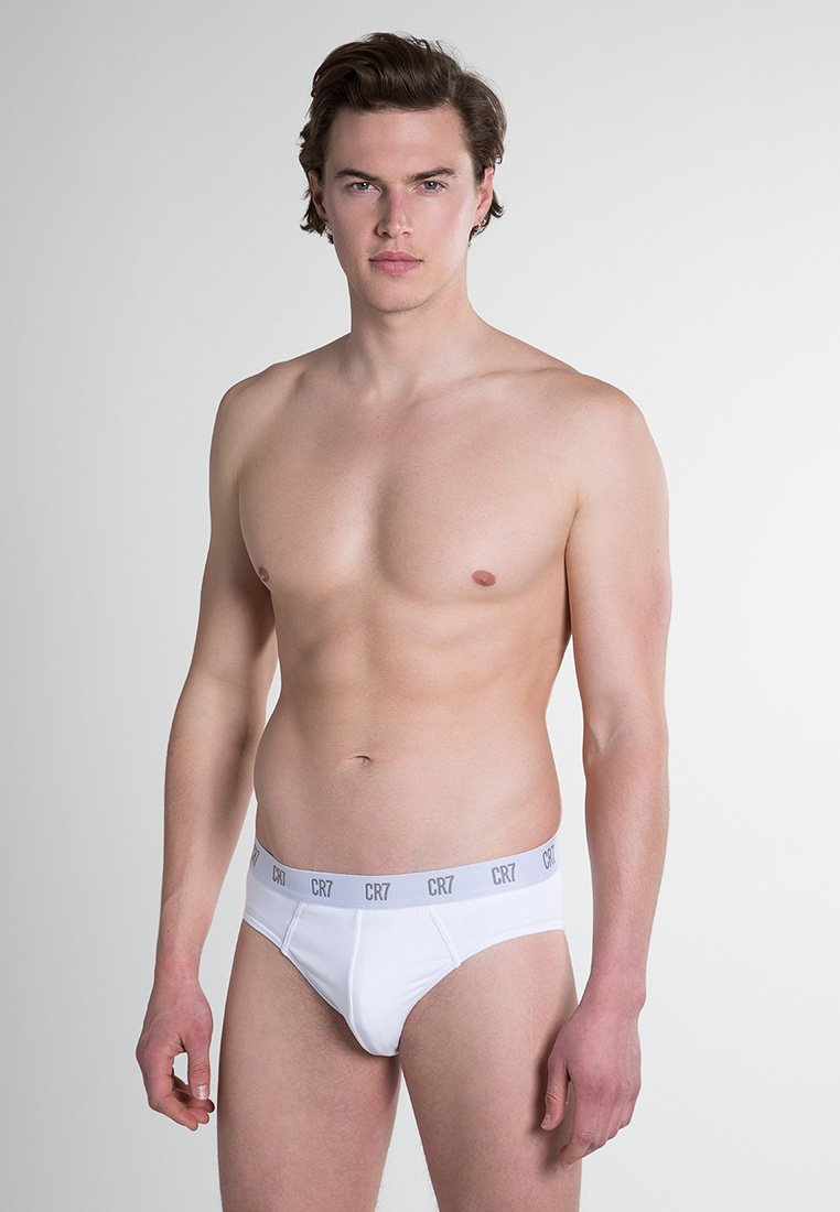 Witte katoenen slips met een grijze elastische tailleband met het "CR7" logo. Ontworpen voor een snug fit, met een gladde textuur en in een klassieke slipstijl.