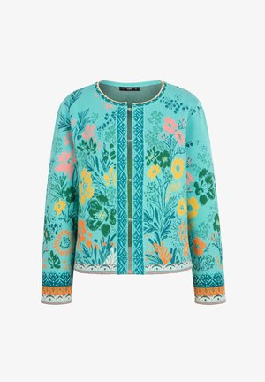 Vihreä neulotun villapaitapuseron takki, jossa on eloisia kukkakuvioita vaaleanpunaisena, keltaisena ja vihreänä, pyöreä kaula-aukko ja nappikiinnitys edessä.