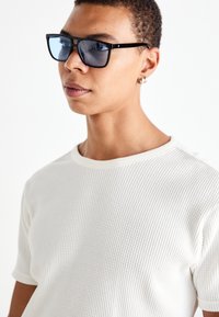 SILJAN UNISEX - Sunglasses - black