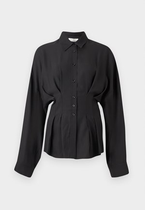 Black long-sleeve shirt in a smooth fabric, featuring a button-up front, curved hem, and gathered detailing at the waist for a tailored fit.
