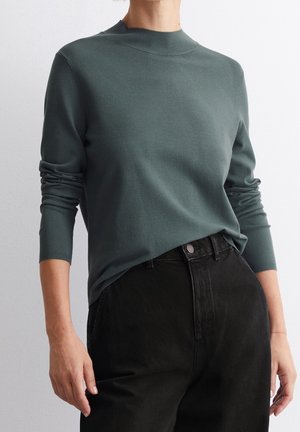 Stickad tröja - dark green