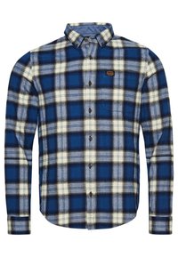 Camicia di flanella a quadri blu e bianchi con maniche lunghe, collo a bottoni e patch brandizzato sul petto. Texture morbida con un fit rilassato.