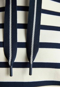 Izbrano, cream navy striped
