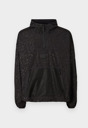 Black hooded pullover jacket with light speckled pattern, quarter zip, large front pocket, and elastic cuffs. Made of a textured, breathable fabric.