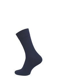 Calzino in cotone blu navy con bordo a costine, texture liscia, lunghezza fino al polpaccio e design senza cuciture nella punta. Adatto per abbigliamento casual o formale.