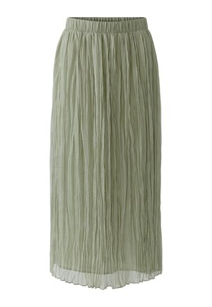 Jupe midi vert clair avec taille élastique et texture froissée verticale, en tissu léger semi-transparent avec doublure opaque.