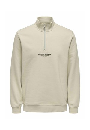 Beige fleece quarter-zip sweatshirt with a high collar. Features a centered logo in black text and ribbed cuffs and hem.