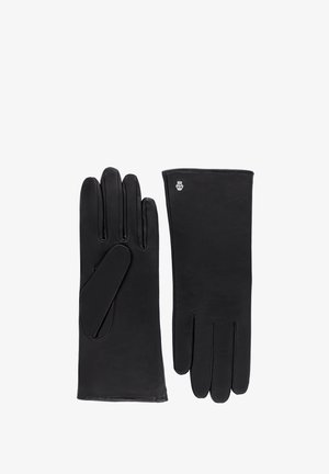 Black leather gloves with five fingers, smooth texture, slightly extended cuff, and a metallic logo accent near the wrist.