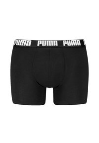 Črne boksarice iz mehkega materiala, z belim blagovnim pasom s logotipom "PUMA". Gladka tekstura, prilegajoča se zasnova.