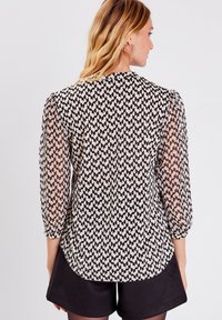 Breal ÄRMELN - Bluse - noir