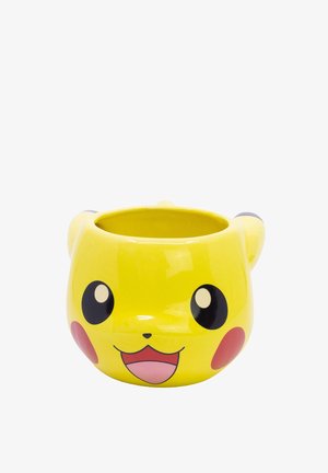 Yellow ceramic cup shaped like Pikachu's head with large eyes, red cheeks, and an open smiling mouth.