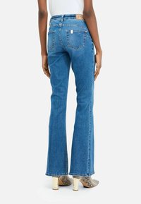 LIU JO HIGH-RISE FLARED  - Jeans Bootcut - LIGHT BLUE