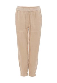 Lichtbeige corduroy broek met een elastische tailleband, voorzien van twee voorzakken en een relaxte pasvorm die taps toeloopt bij de enkel.