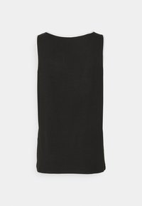 Haut noir sans manches en tissu doux, avec un col rond orné d'une bordure blanche et une coupe décontractée, au design élégamment simple.