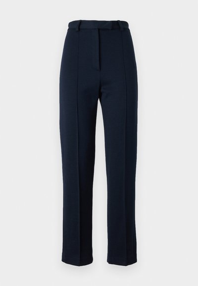 Navy blue, tailored trousers made of textured fabric; features a belt loop waist and central crease down the front. Slim, straight leg design.
