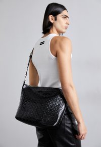 MOONOGRAM EMBOSSED UNISEX - Cabas - black