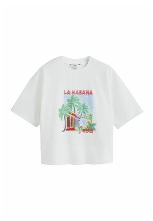 White short-sleeve t-shirt with colorful print of palm trees, a house, water, and text "LA HABANA Cuba" on the front.