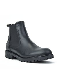 Botas de tobillo de cuero negro con un acabado suave, paneles laterales elásticos y una suela de goma texturizada. Diseño de tacón bajo y punta redondeada.