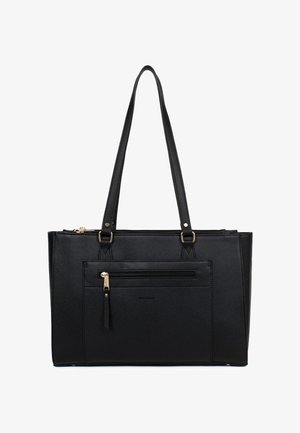 Sac cabas en cuir noir avec deux longues anses, poche zippée à l'avant et détails de fermeture éclair dorés sur fond blanc.