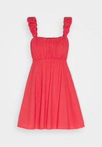 Robe sans manches rouge avec un tissu froncé au niveau de la poitrine, des bretelles à volants et une jupe évasée. Confectionnée dans un matériau léger.