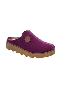 Zoccolo viola in feltro con una soletta in sughero testurizzata, cuciture a zigzag e una toppa a forma di logo circolare sul lato. Suola spessa e rigata per una buona presa.
