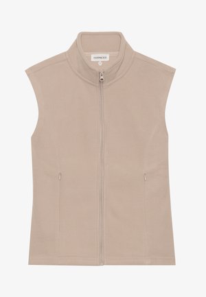 Chaleco sin mangas de felpa beige con un collar alto, cremallera frontal y dos bolsillos laterales. Textura suave y diseño aerodinámico.
