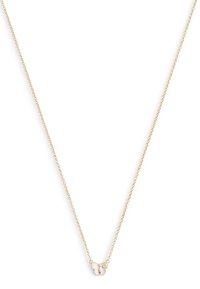 Gold chain necklace featuring a small butterfly pendant with a textured design and a central accent, creating a delicate visual detail.